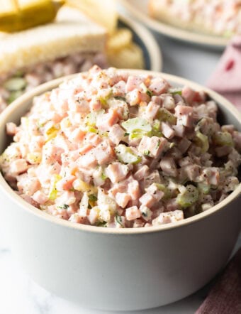 White bowl brimming with homemade chopped ham salad.