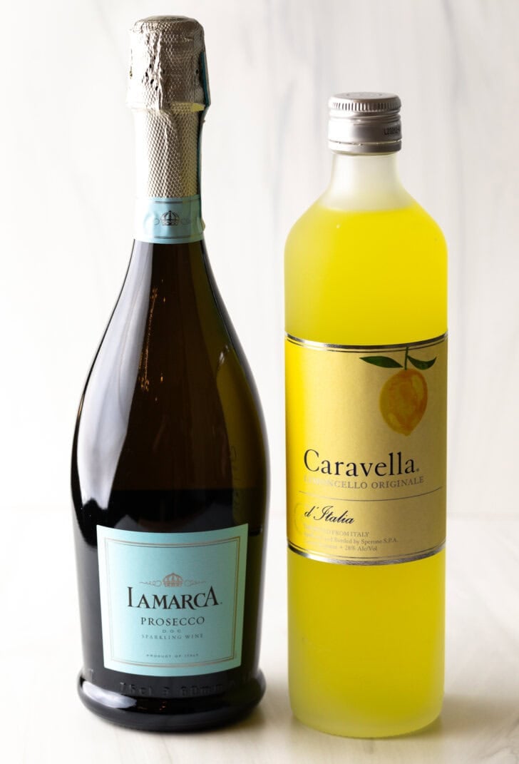Bottle of prosecco and bottle of limoncello.