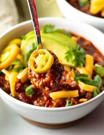 Venison Chili Recipe lifted up on spoon