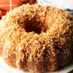 Rum soaked bundt cake covered in toasted coconut.