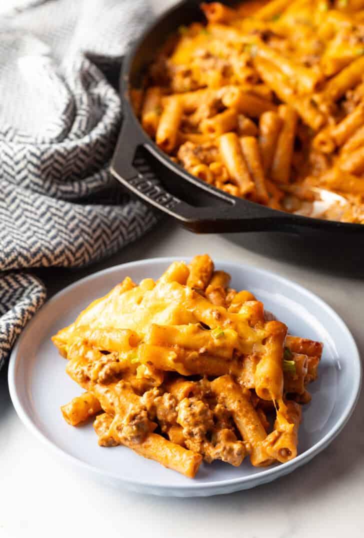 Gray plate with serving of cheeseburger casserole.