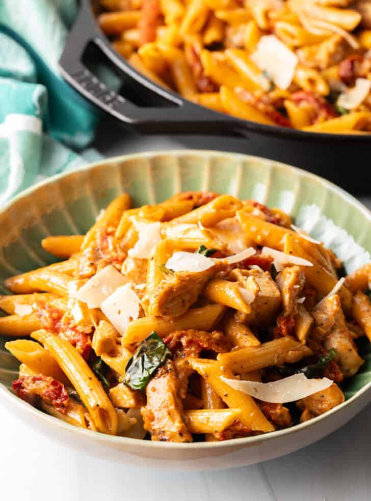 Green bowlful of marry me chicken pasta.