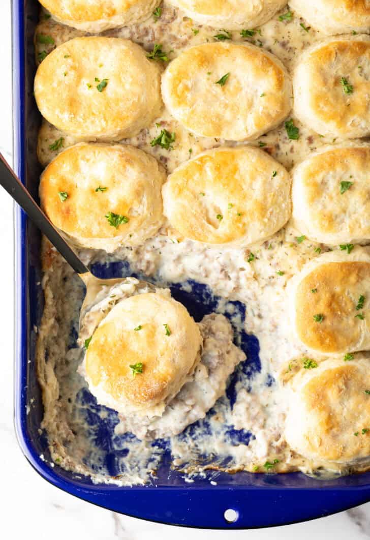 pan of biscuits with sausage gravy underneath