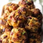 Top down view of a mound of stuffing balls in a white rectangle dish.