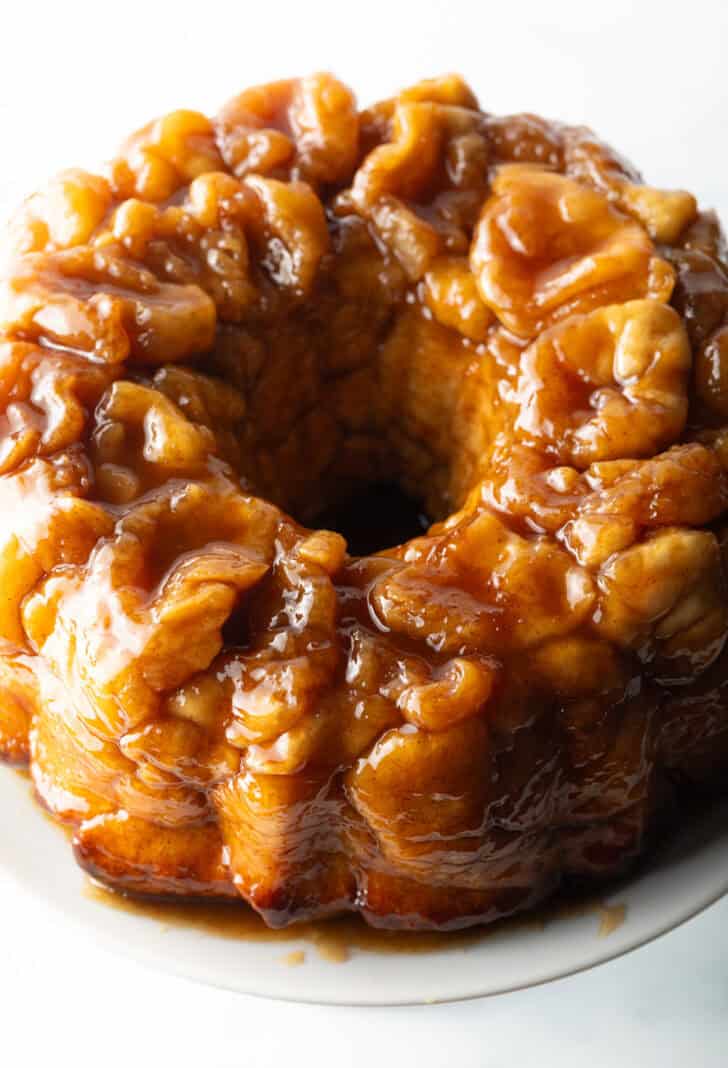 Top down view baked bundt monkey bread with bourbon syrup.