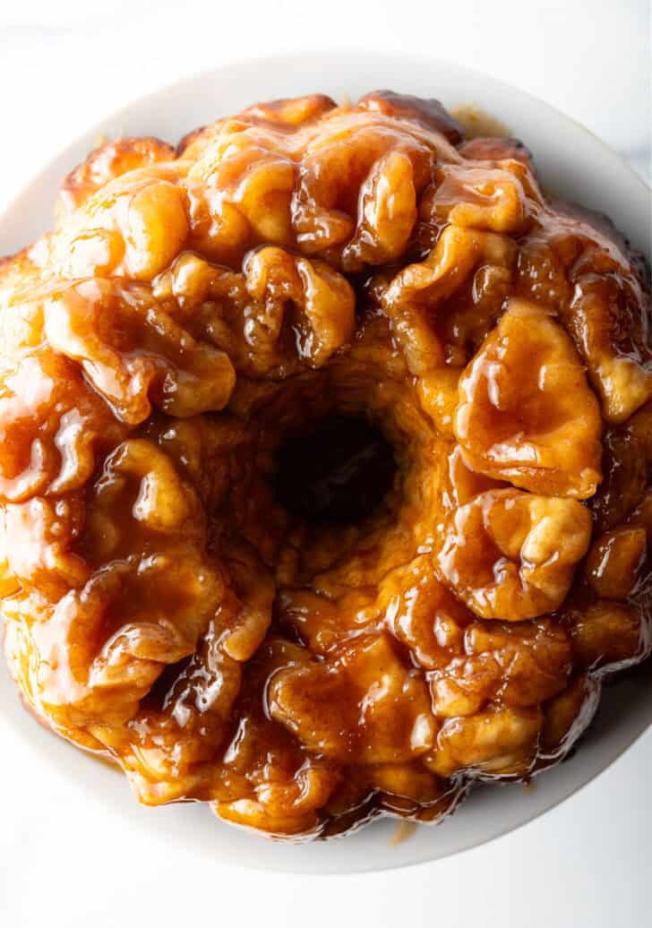 Top down view baked bundt monkey bread with bourbon syrup.