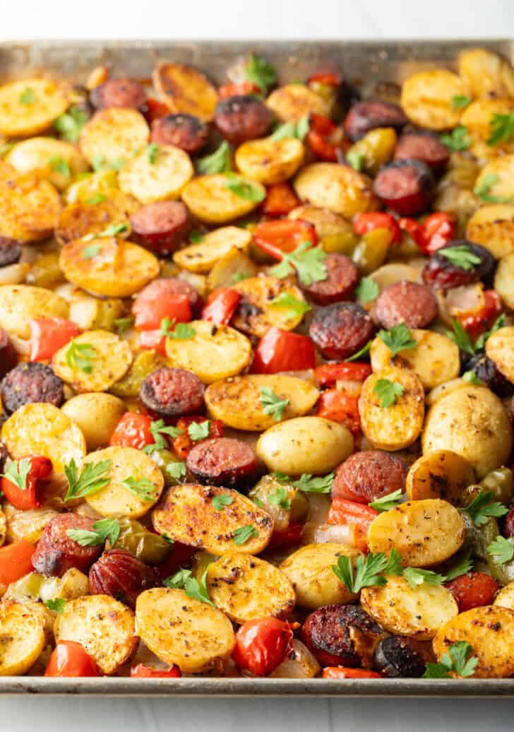Side view of sheet pan sausage and veggies.