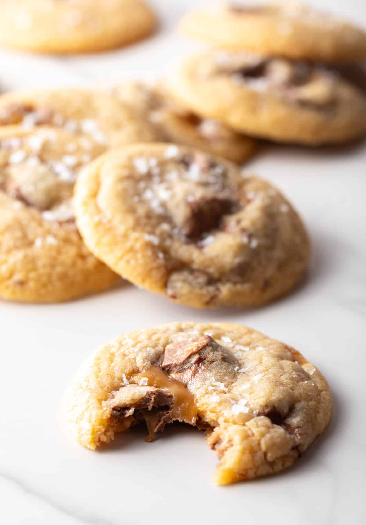 Close up shot of a Milky Way cookie with a bite taken out.