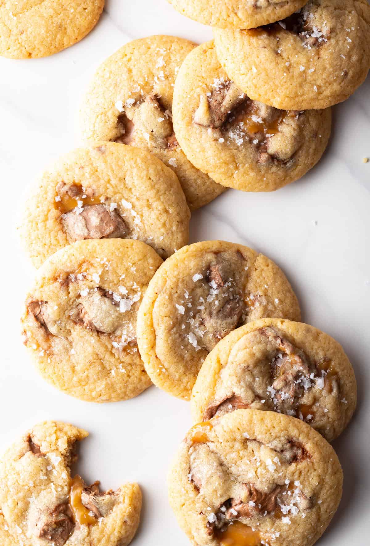 A batch of cookies with Milky Way bars stacked horizontally in a swirl pattern.