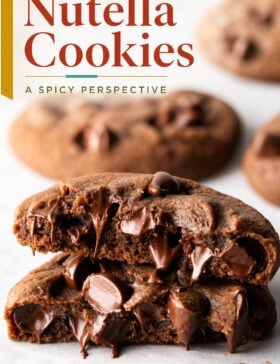 Single-image poster of fudgy Nutella cookies stacked on a surface, styled in warm golden, deep red, teal, and olive tones.