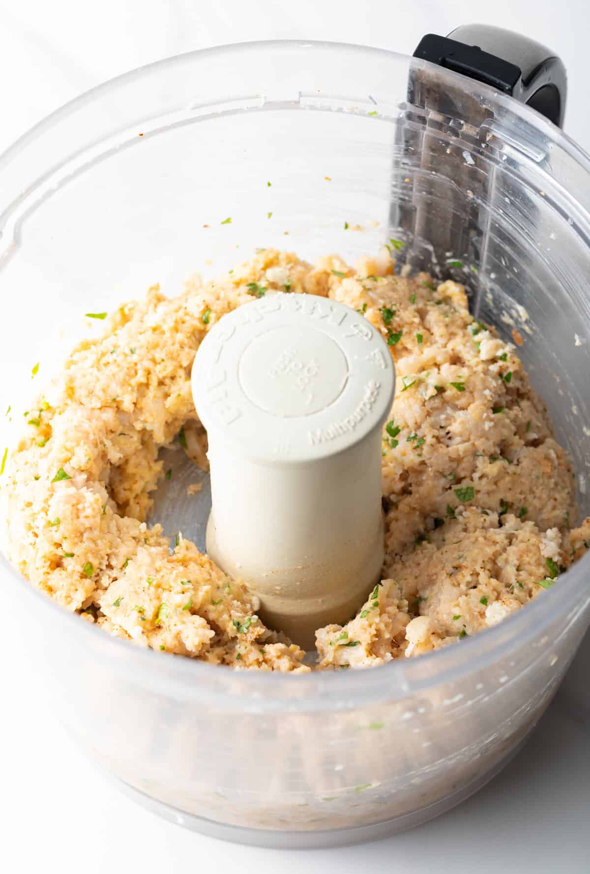 A fish burger mixture that has been blended in a food processor, ready to turn into fish patties.