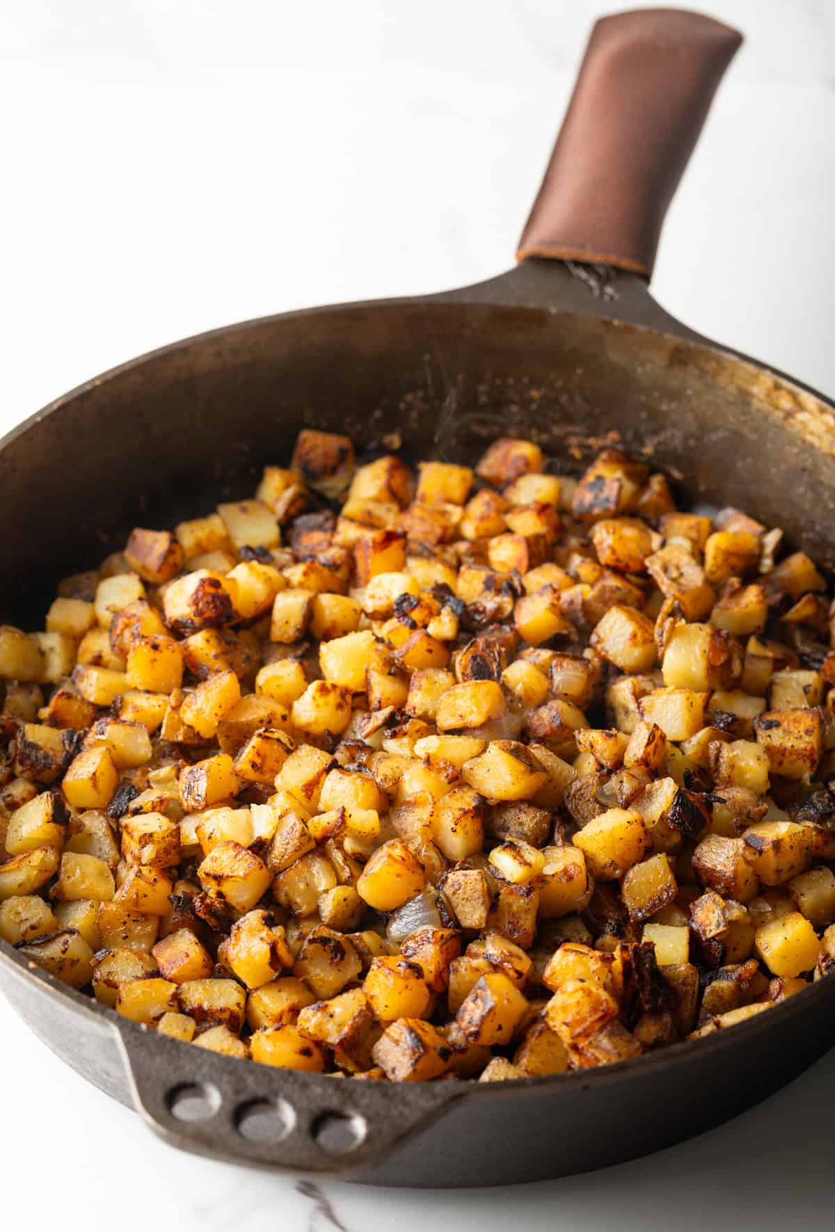 Skillet of fried potatoes.