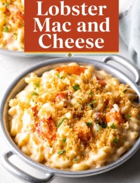 Single-image poster of creamy lobster mac and cheese in a skillet, styled with warm golden, deep red, teal, and olive tones — rich, cozy, and restaurant-quality.