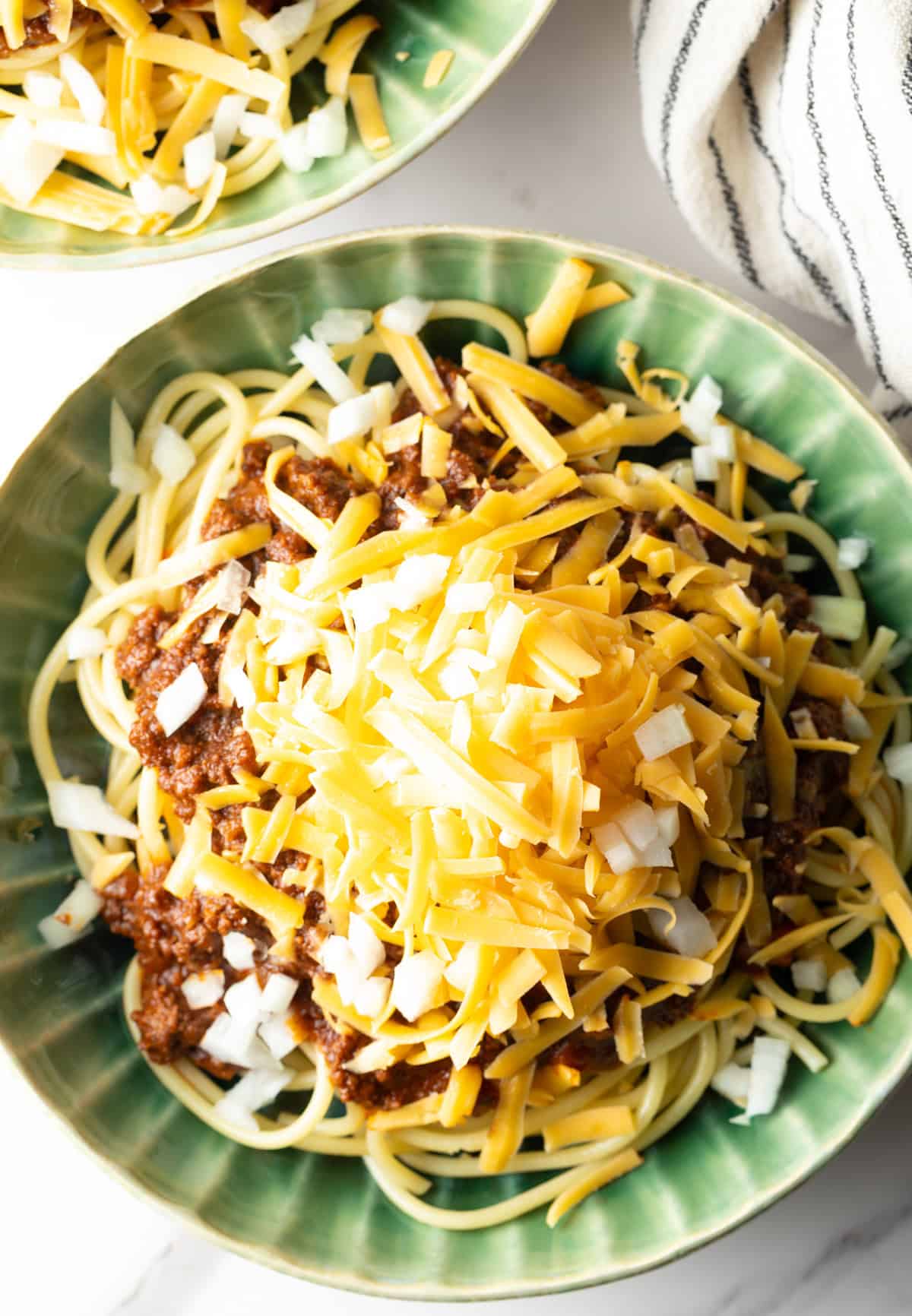An overhead shot of a bowl of a Cincinnati chili recipe.
