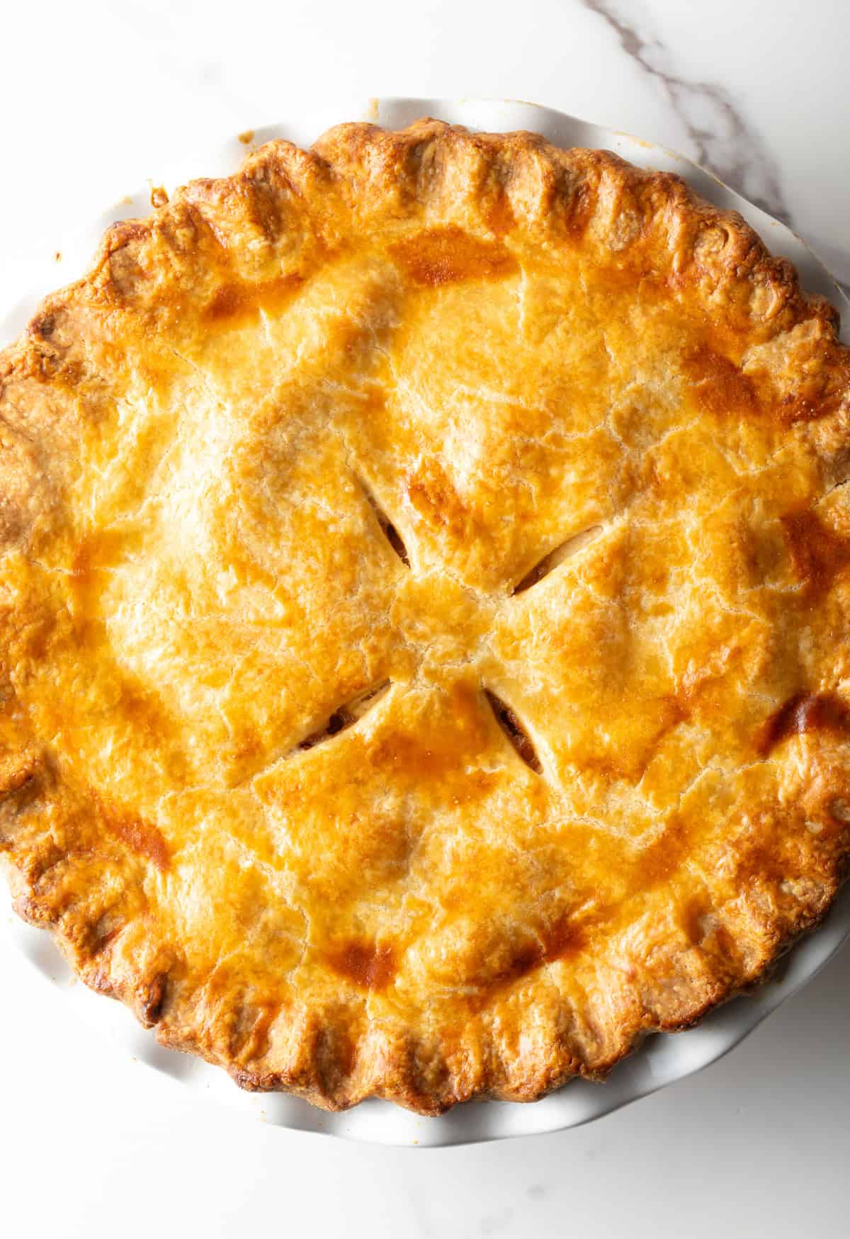 An overhead shot of a freshly baked apple pie recipe.