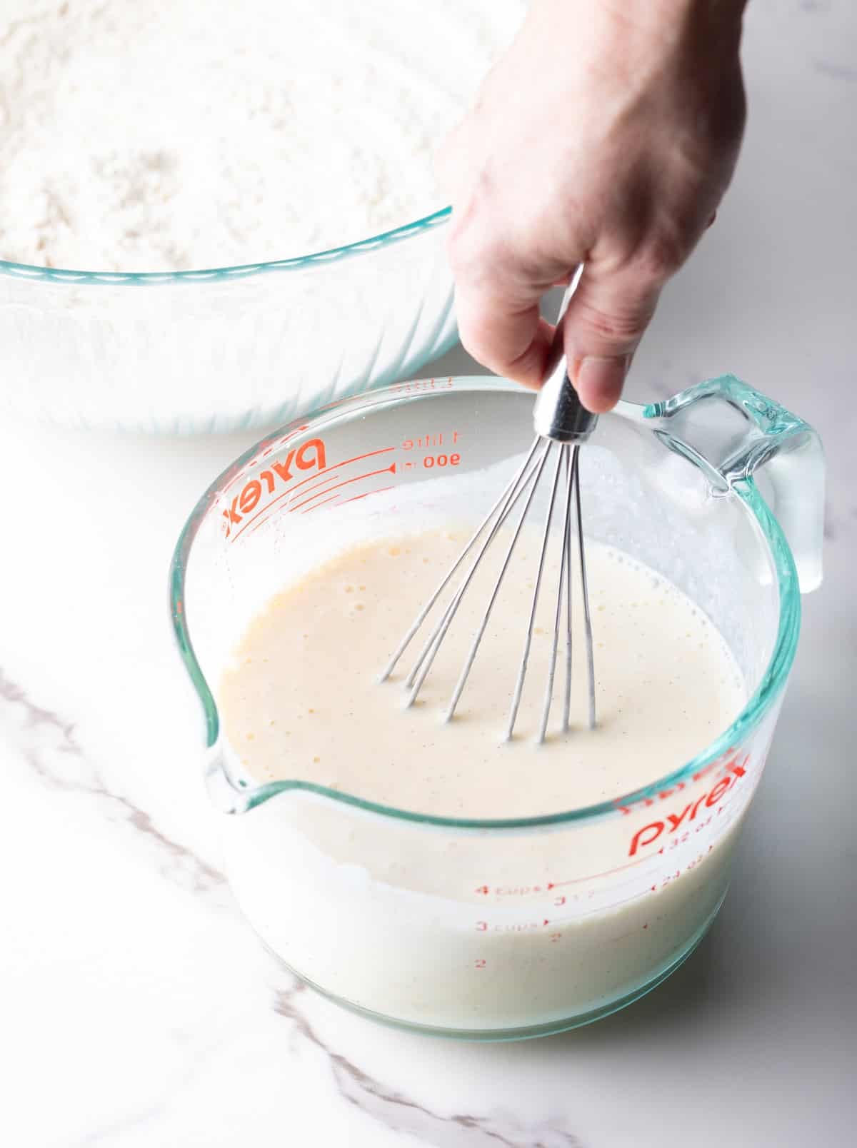 mixing the wet ingredients for griddle cakes