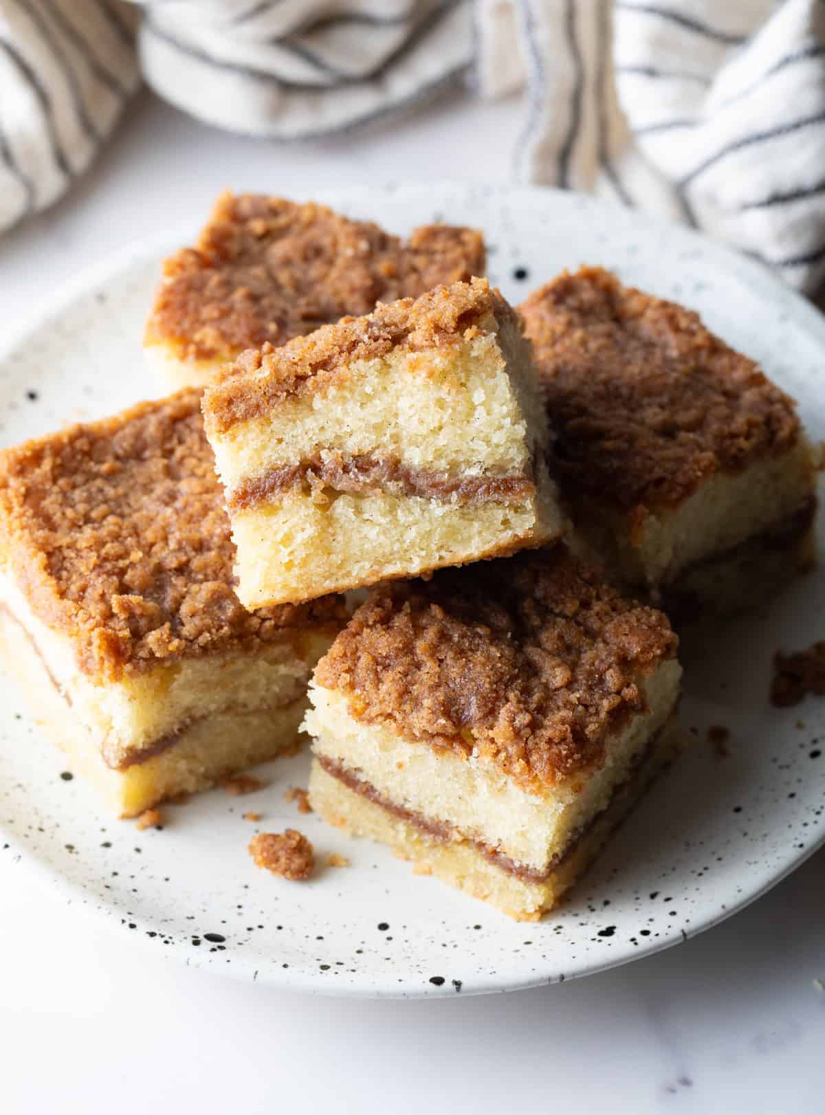 An overhead shot of slices of a sour cream coffee cake recipe.